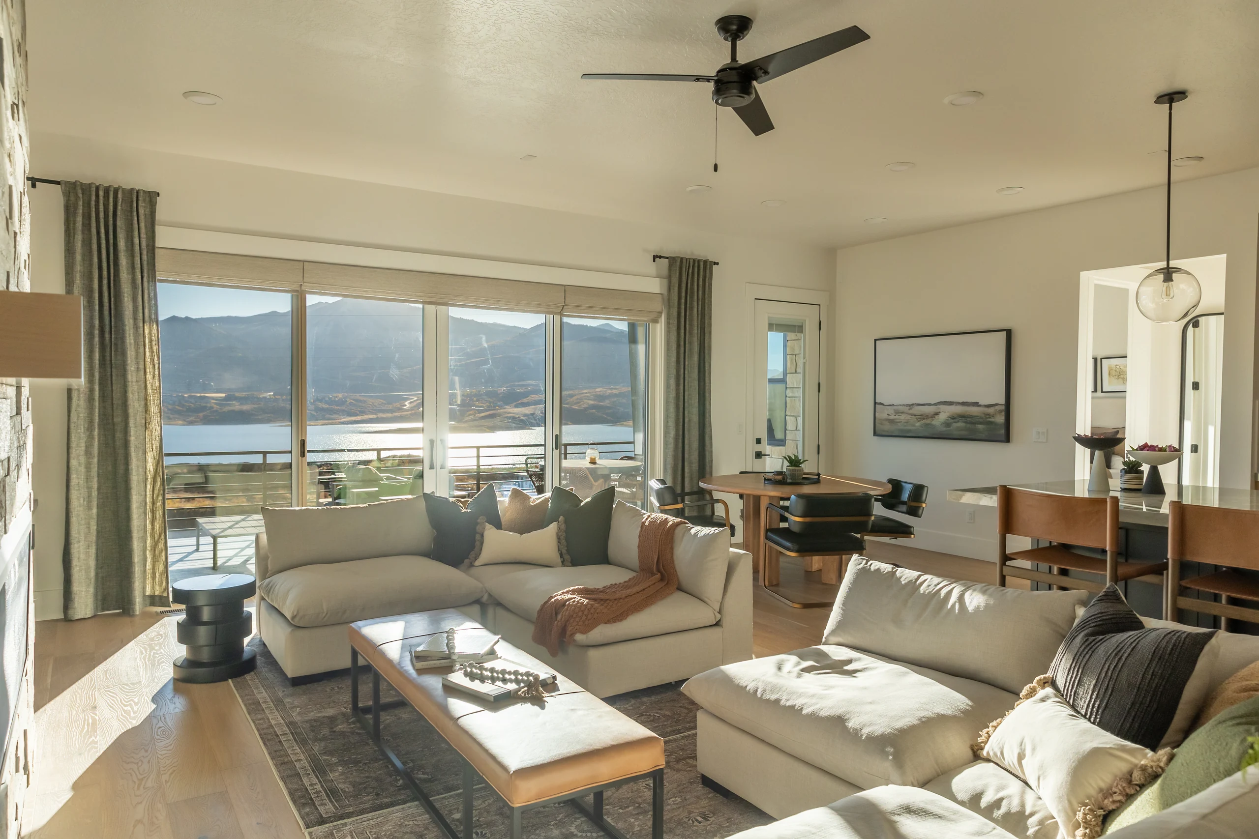 Shoreline Phase III living room and terrace overlooking Jordanelle Reservoir