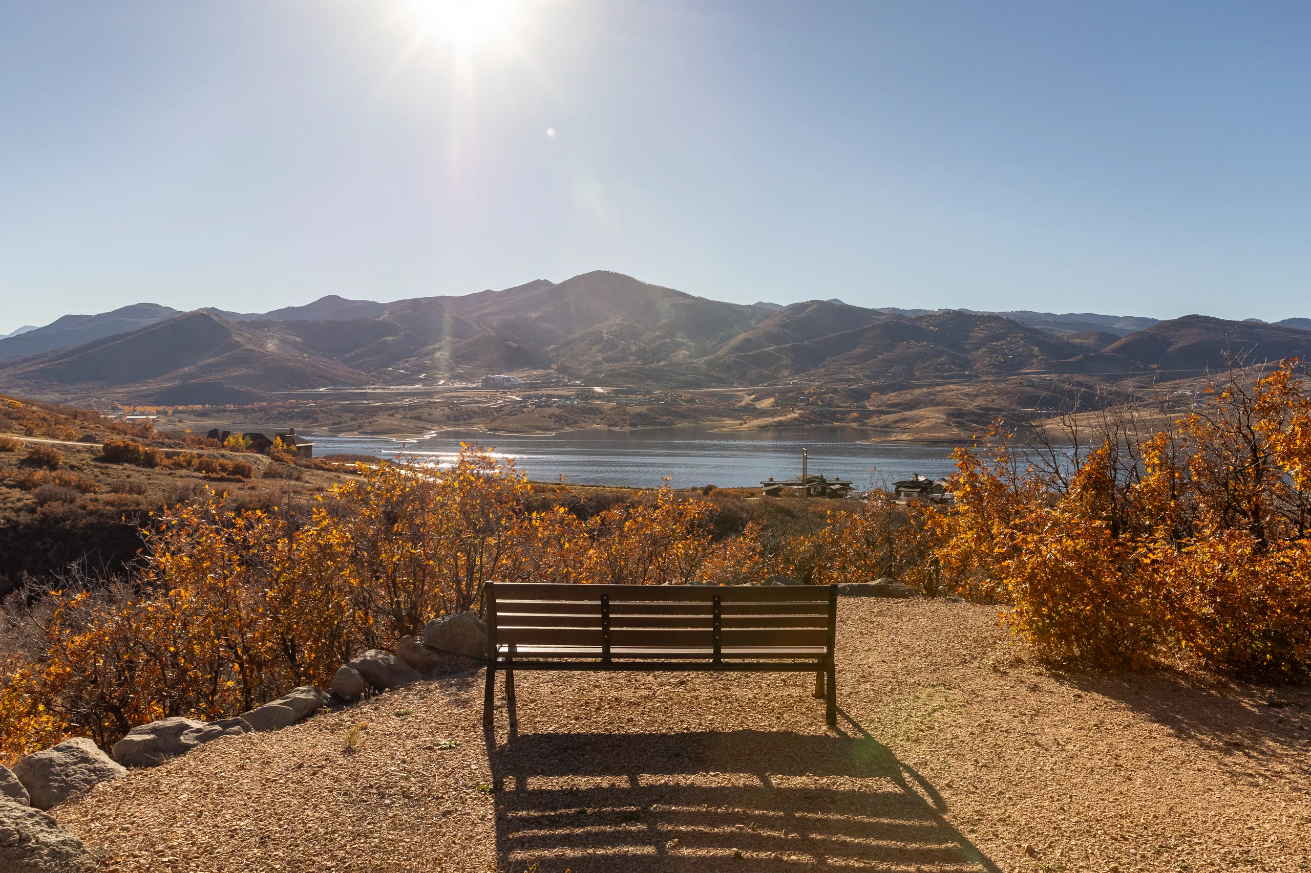Shoreline landscaping, shared seating and homes above Jordanelle Reservoir